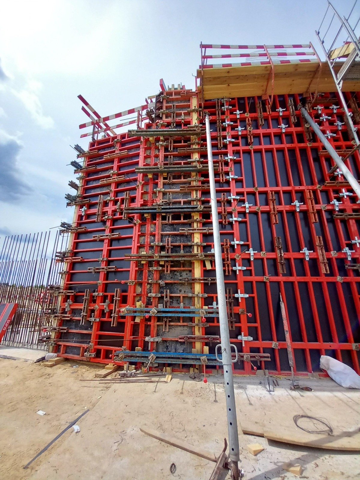 Steel column formwork components installed for reinforced concrete structural works.