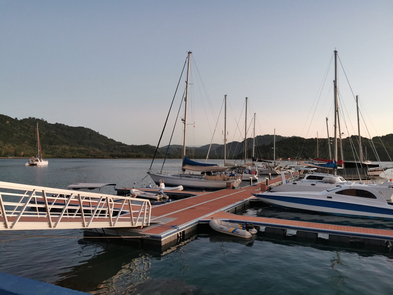 Modular floating marina dock system installed along a waterfront development.